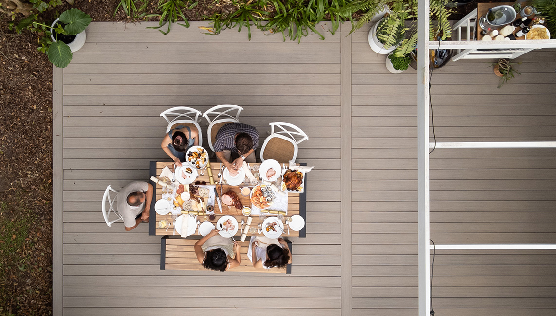 An aerial view of a group of people at a table.