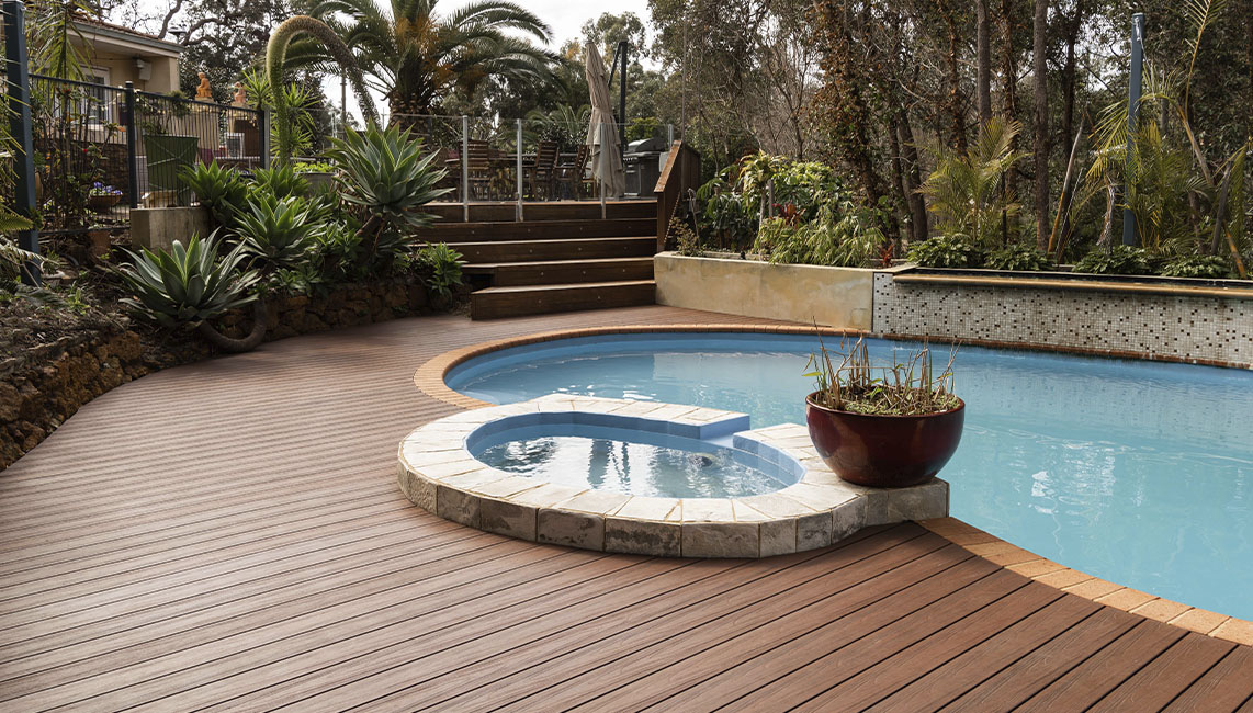 composite decking by pool and spa